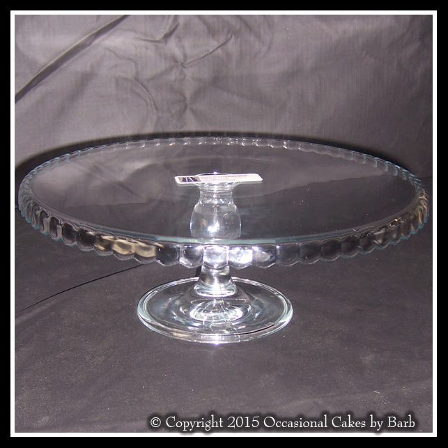 glass stand with drop edge decoration