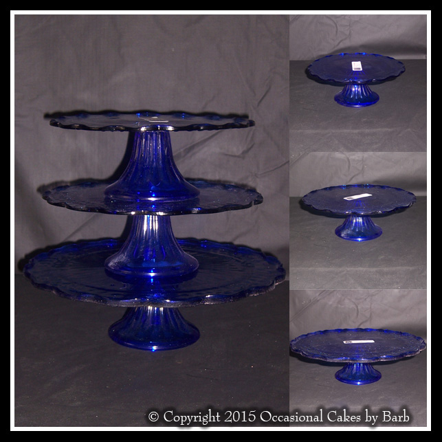 Set of three blue glass stands