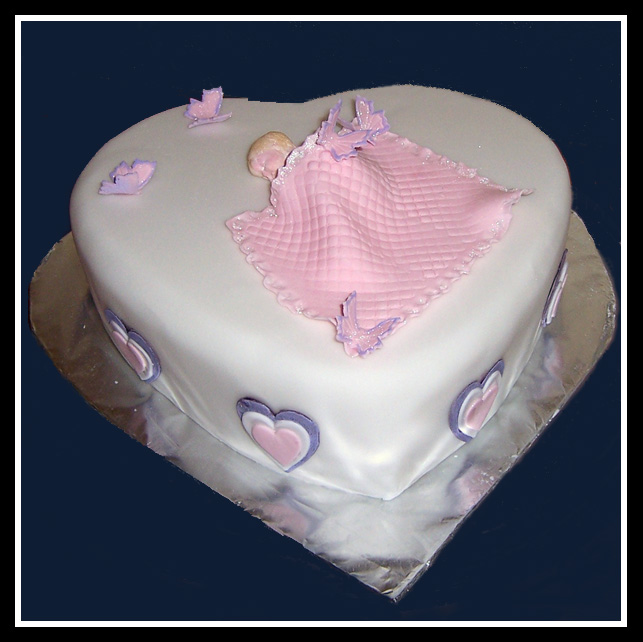 Clare's slepping baby in pink blanket cake