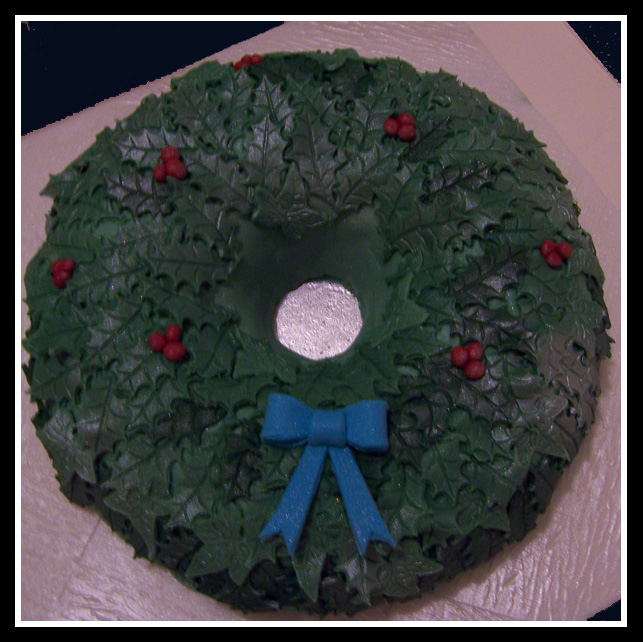 Holly Wreath cake with blue bow