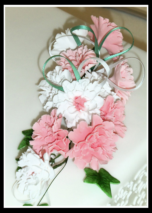 Small carnation spray in white and pink