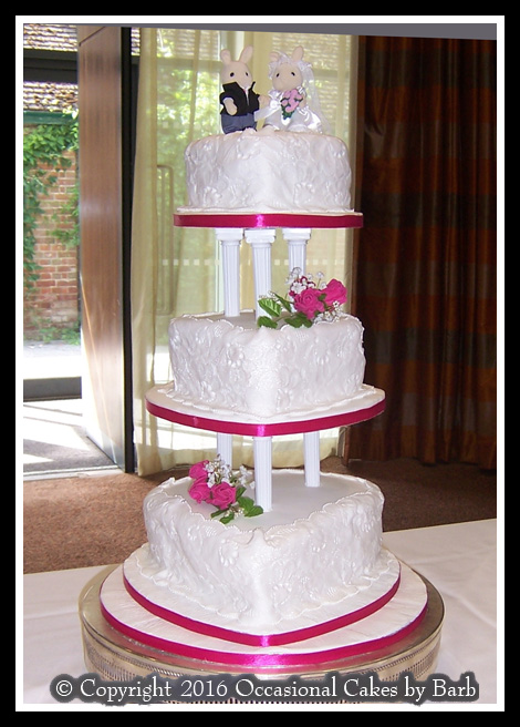 Three tier heart shaped cake with moulded lace