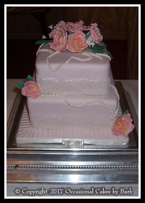 Edible lace and pearls wedding cake