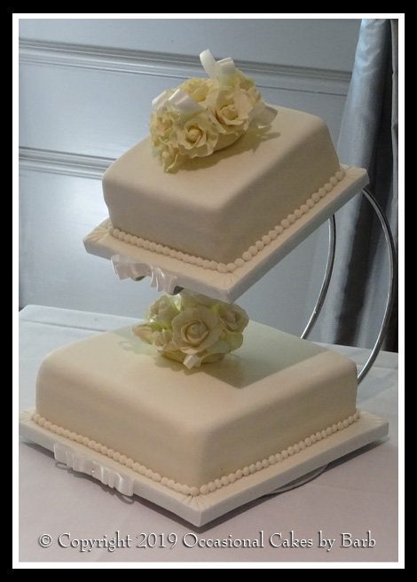Elegant two tier ivory wedding cake