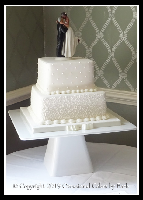White two tier stacked cake