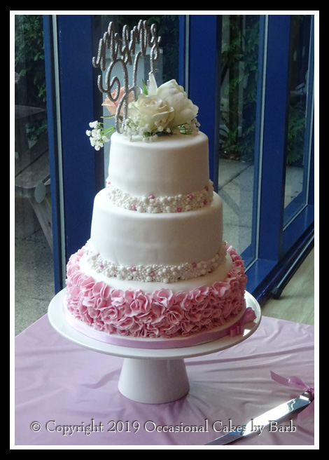 Pink ruffles wedding cake