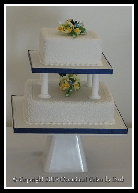 White two tier traditional wedding cake